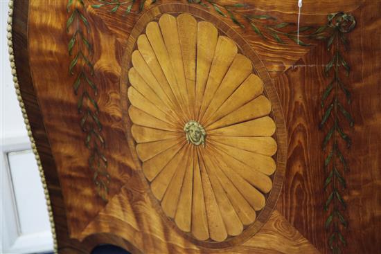 A George III style satinwood and marquetry serpentine commode, in the style of John Cobb, W.4ft 6.5in.